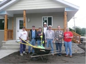 St.-Cloud staff helping build a home